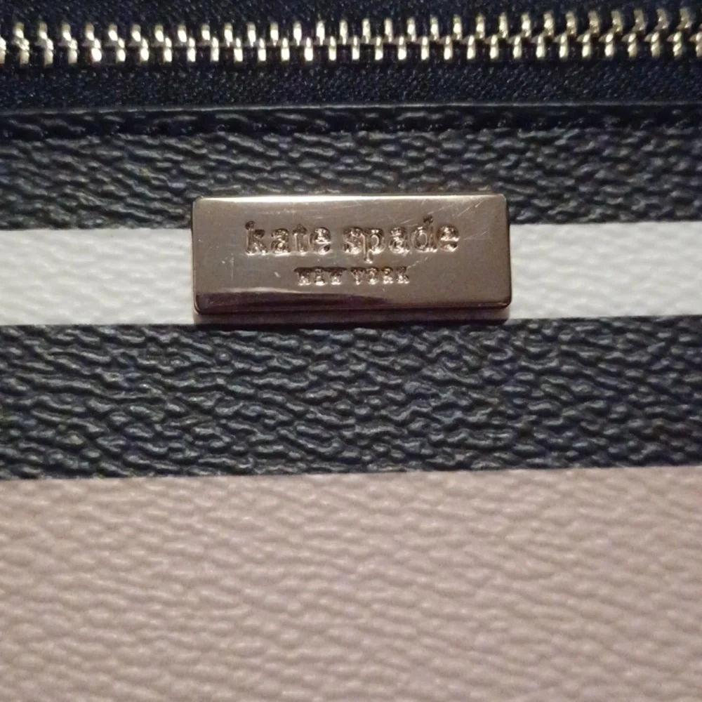 > Kate Spade Striped Black and Tan Wristlet
